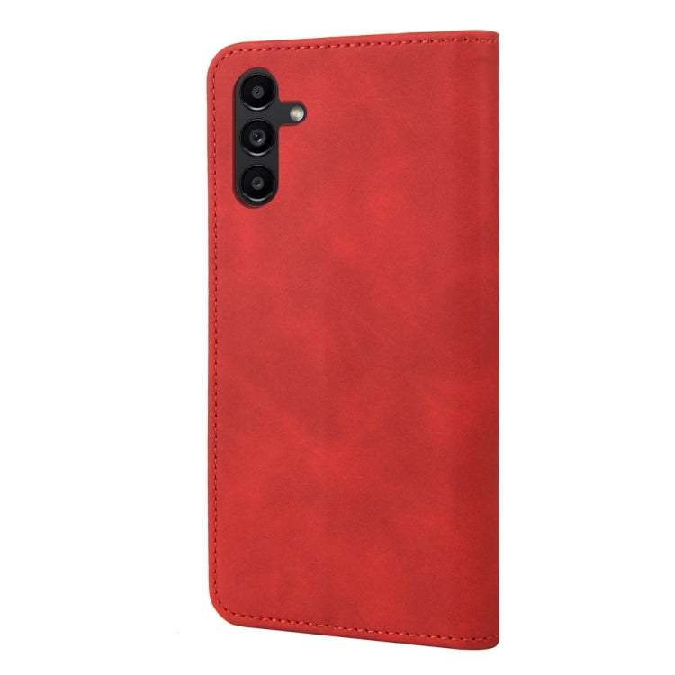Red splicing leather phone case for Samsung Galaxy A05s, featuring a wallet design with card slot and stand functionality.